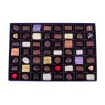 Χάρτινο μπλέ κουτί πολυτελείας και 900 γρ. σοκολατάκια Leonidas