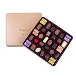 Τετράγωνο χρυσό μεταλλικό κουτί με 520 γρ ποικιλία σοκολατάκια Leonidas