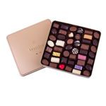 Τετράγωνο χρυσό μεταλλικό κουτί με 670 γρ. ποικιλία σοκολατάκια Leonidas