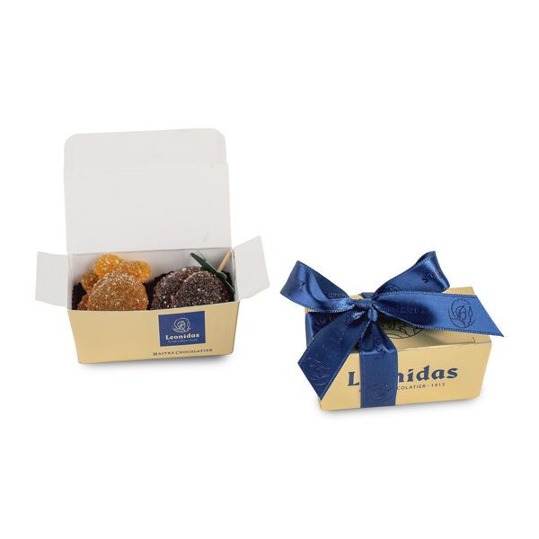 Μίνι χάρτινο κουτάκι σε χρυσό χρώμα με 2 pates de fruit (ζελεδάκια φρούτων) Leonidas & κορδέλα