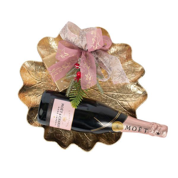 Πιατέλα σε χρυσό χρώμα με χριστουγεννιάτικο αμπαλάζ, σαμπάνια Moet Rose και 500 γρ. σοκολατάκια Leonidas