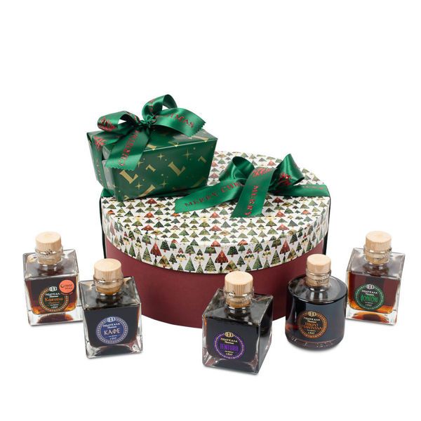 Χάρτινη Χριστουγεννιάτικη καπελιέρα Christmas Story με λικέρ Πολυκαλά και σοκολατάκια Leonidas