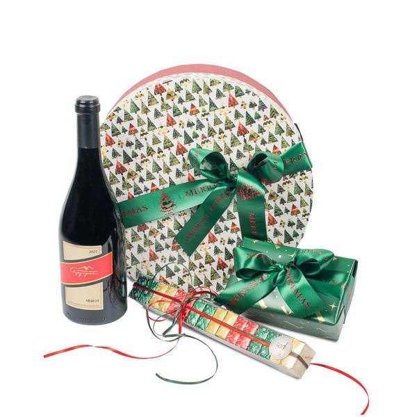 Χάρτινη Χριστουγεννιάτικη καπελιέρα Christmas Story με λικέρ Πολυκαλά και σοκολατάκια Leonidas