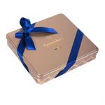 Τετράγωνο χρυσό μεταλλικό κουτί με 1,74 κιλά σοκολατάκια gianduja, giantina, giamanda Leonidas