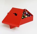 Μεταλλικό κουτί σε κόκκινο χρώμα με 720 γρ σοκολατένια αυγουλάκια Leonidas